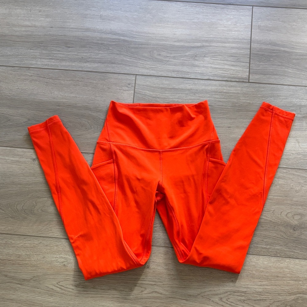 NWOT Lululemon align with pockets high-rise 28 inch double lined solar orange